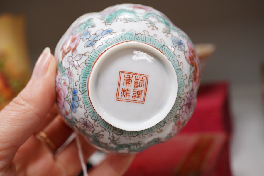 A collection of late 20th century Chinese boxed eggshell bowls, and four wood stands
